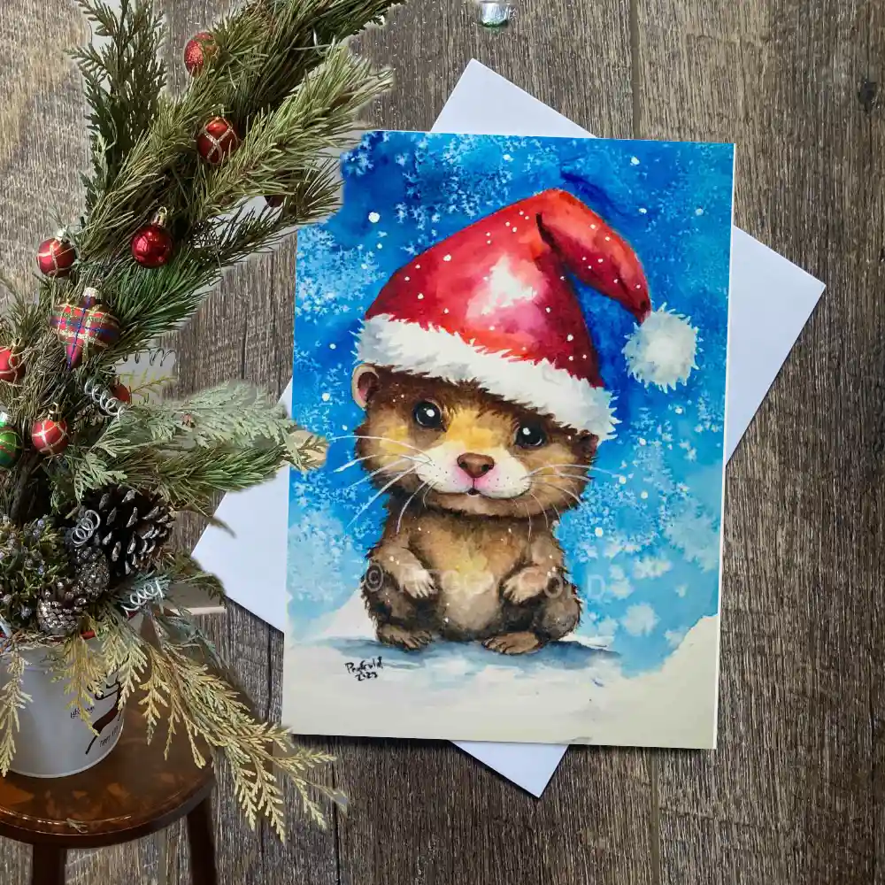 Watercolour Otter Christmas card wearing a Santa hat